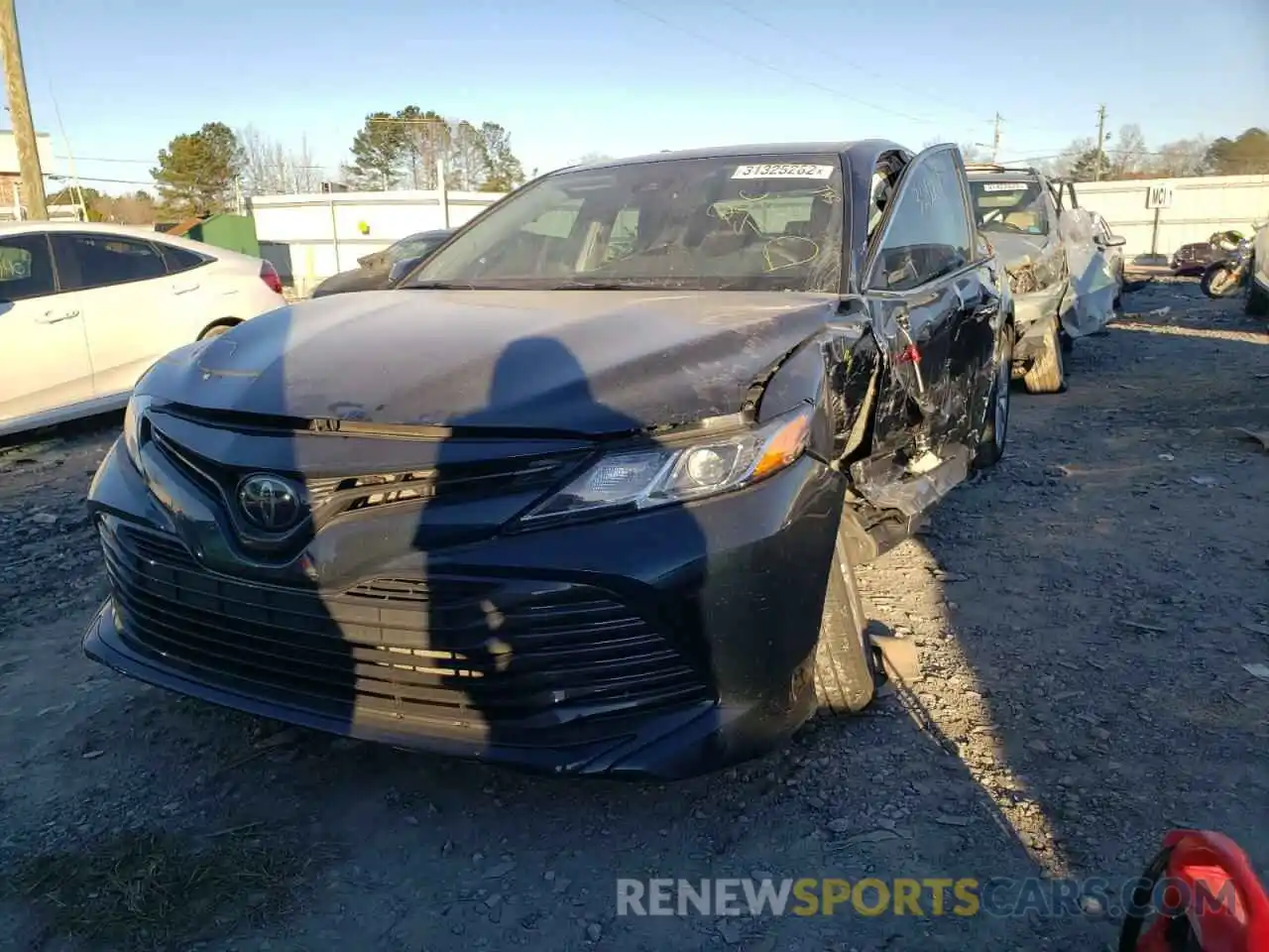 2 Photograph of a damaged car 4T1B11HK2KU809864 TOYOTA CAMRY 2019