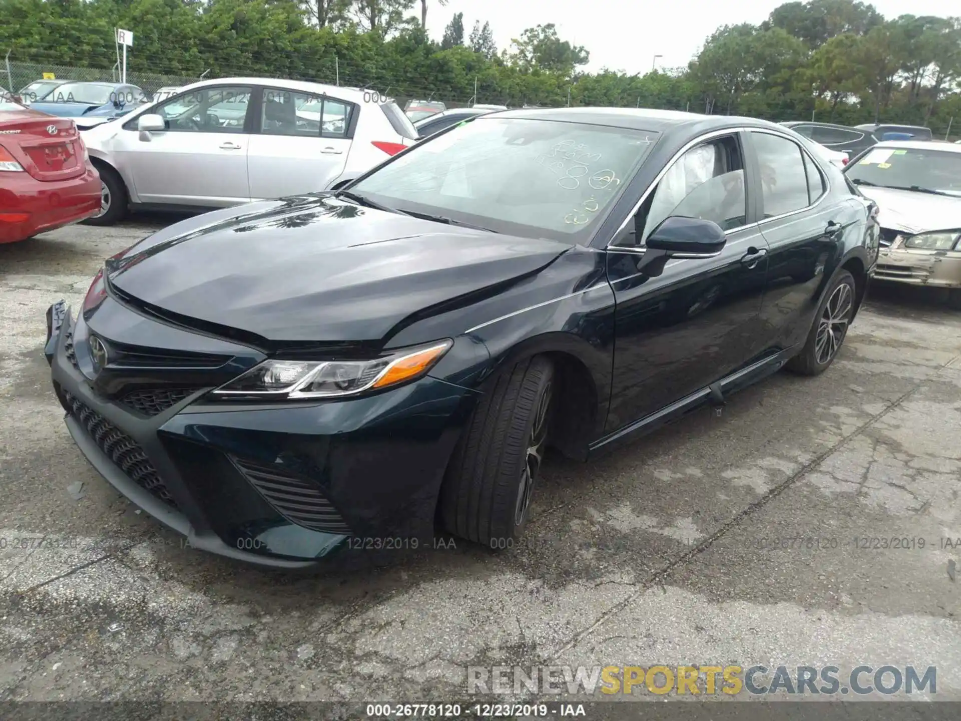 2 Photograph of a damaged car 4T1B11HK2KU810013 TOYOTA CAMRY 2019