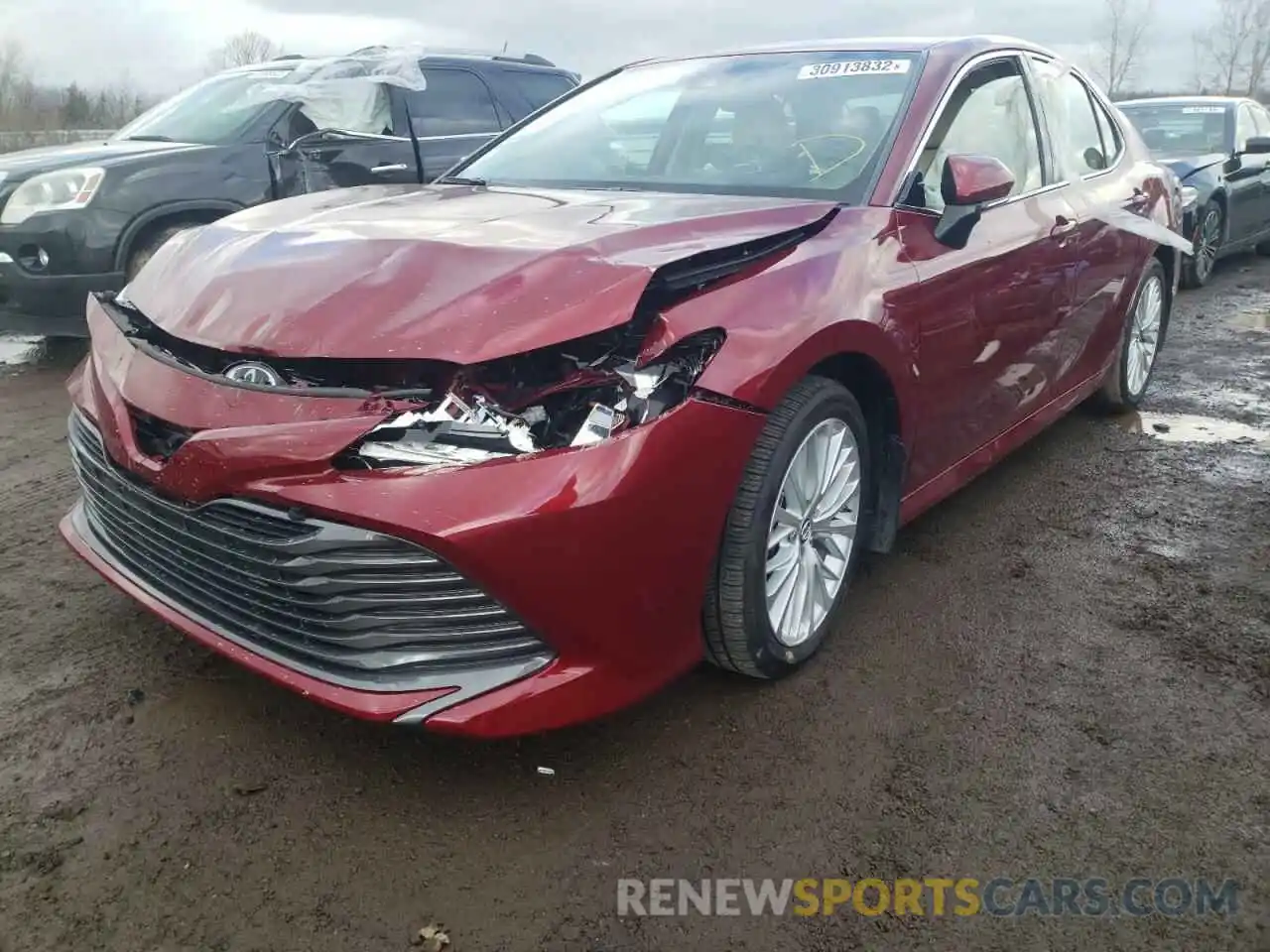 2 Photograph of a damaged car 4T1B11HK2KU810108 TOYOTA CAMRY 2019