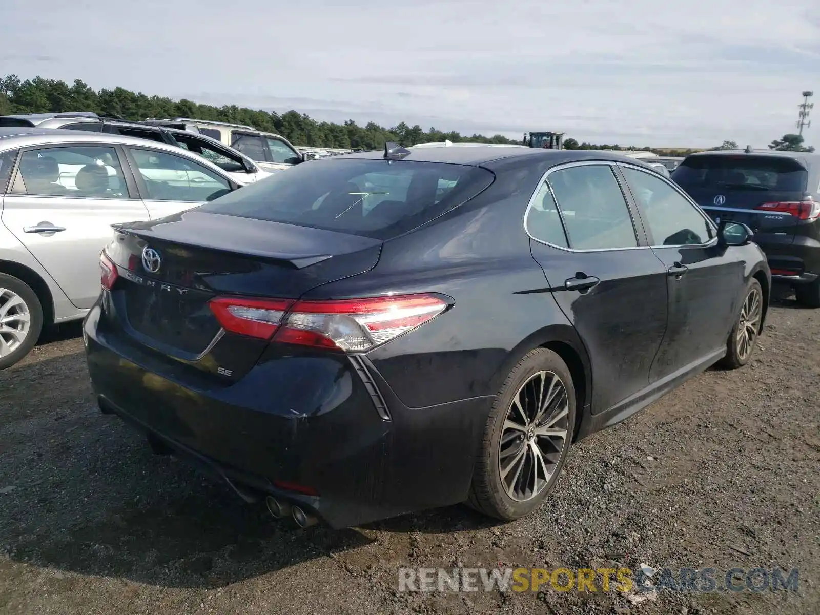 4 Photograph of a damaged car 4T1B11HK2KU811145 TOYOTA CAMRY 2019