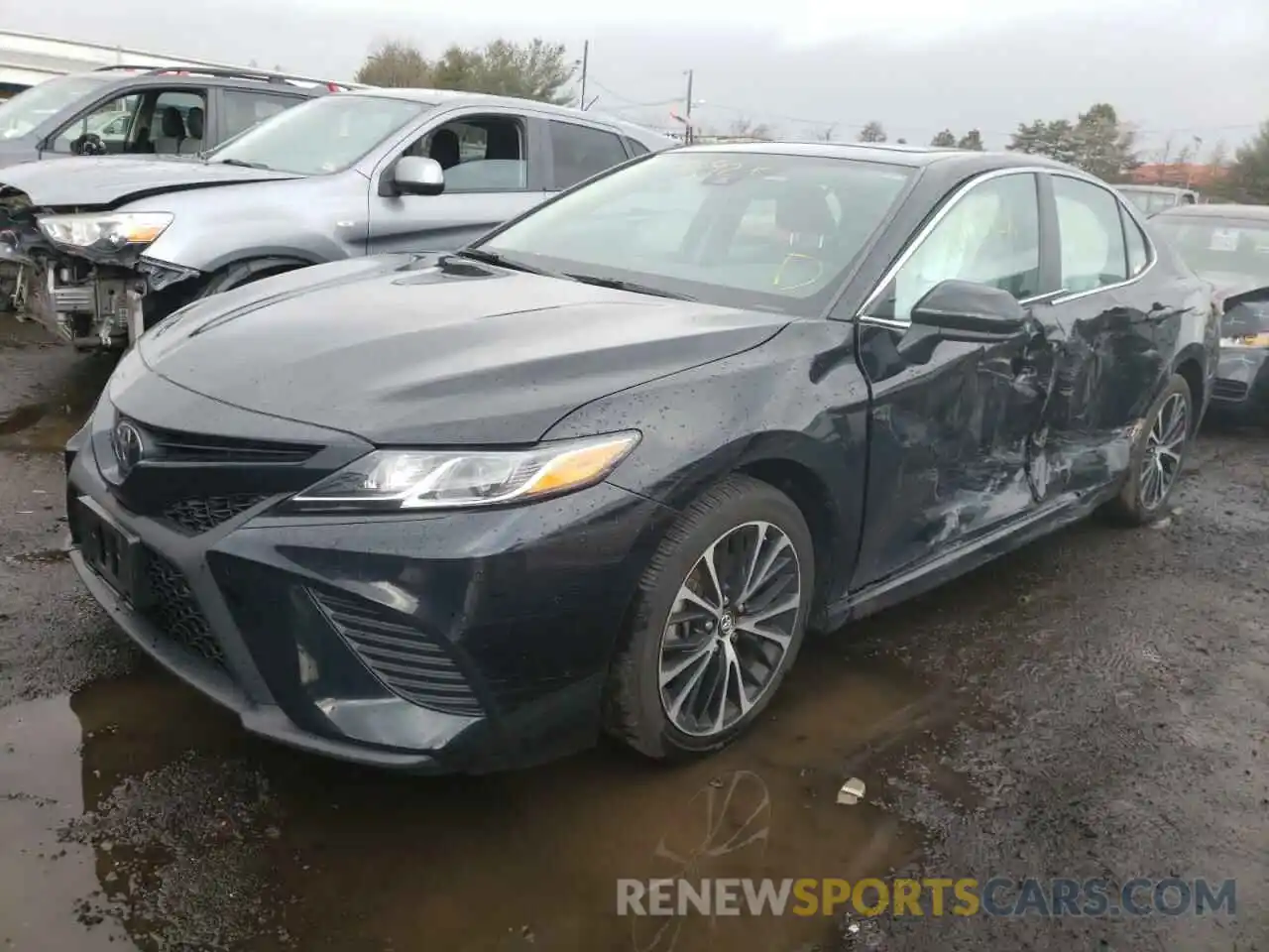 2 Photograph of a damaged car 4T1B11HK2KU813252 TOYOTA CAMRY 2019