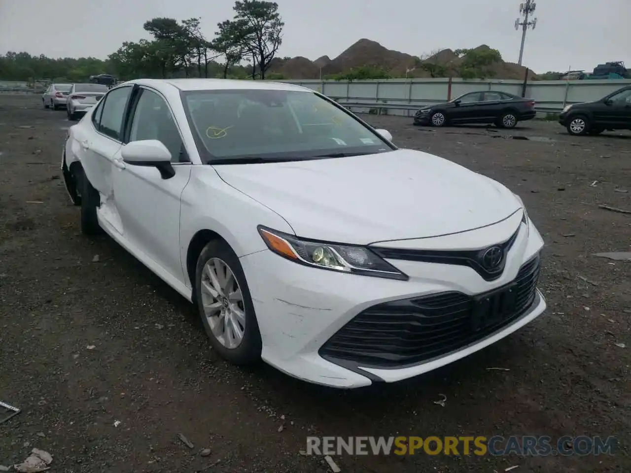 1 Photograph of a damaged car 4T1B11HK2KU817205 TOYOTA CAMRY 2019