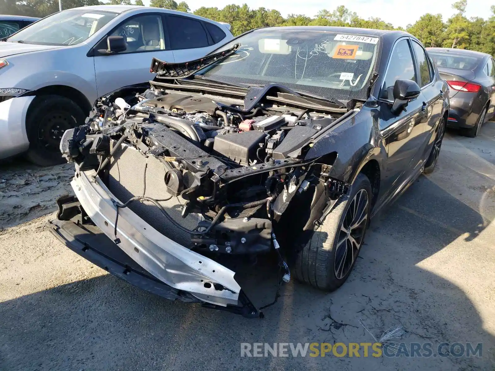 2 Photograph of a damaged car 4T1B11HK2KU818046 TOYOTA CAMRY 2019