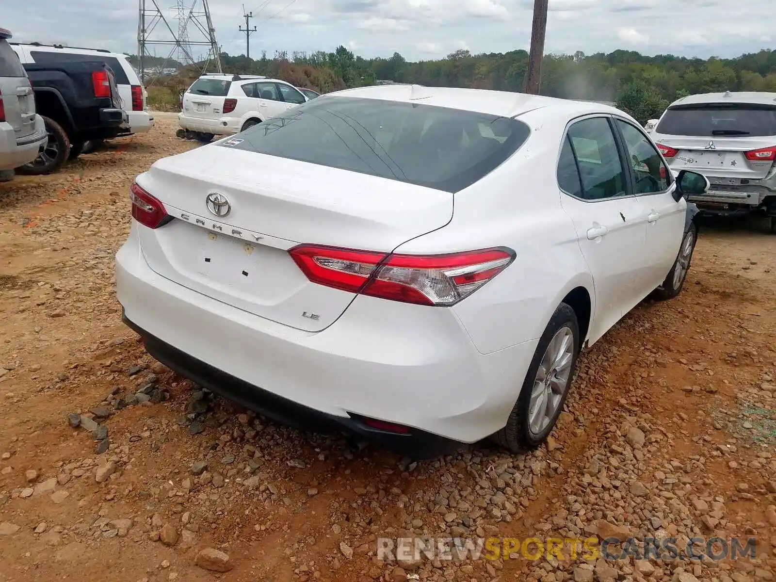 4 Photograph of a damaged car 4T1B11HK2KU819732 TOYOTA CAMRY 2019