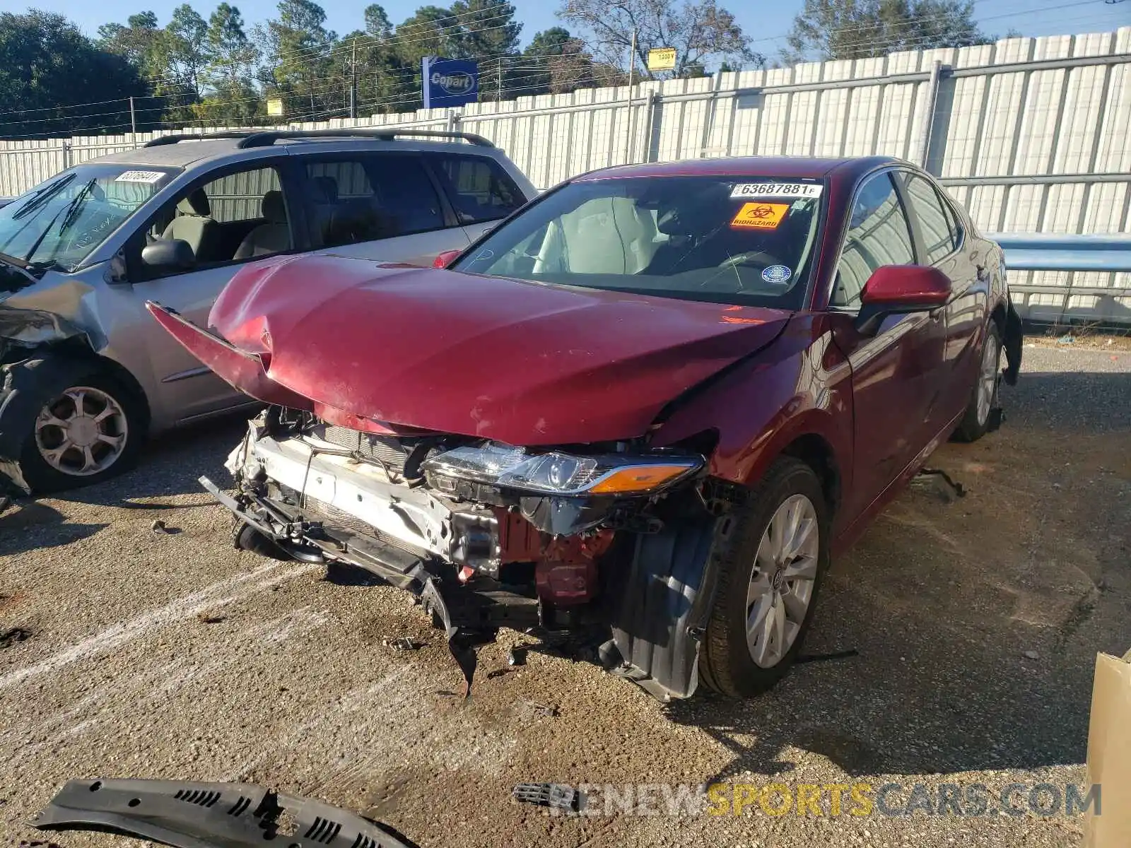 2 Photograph of a damaged car 4T1B11HK2KU823117 TOYOTA CAMRY 2019