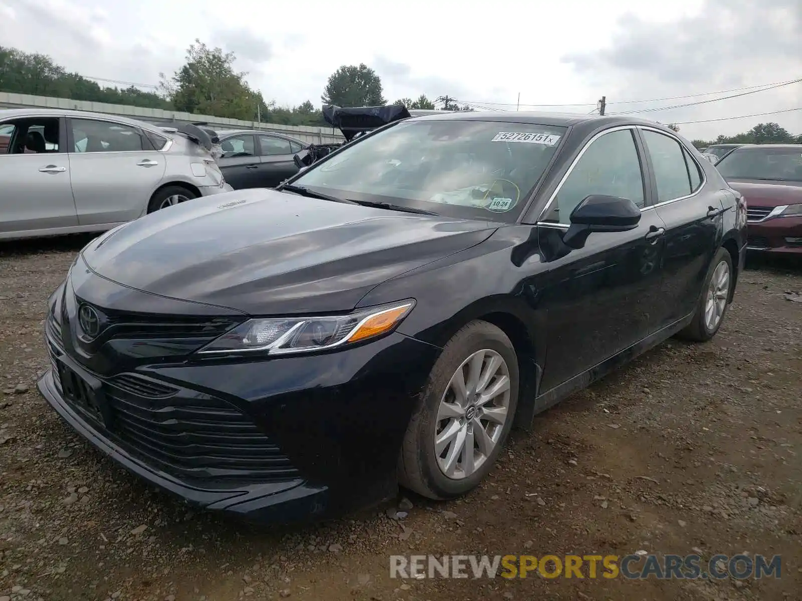 2 Photograph of a damaged car 4T1B11HK2KU824784 TOYOTA CAMRY 2019