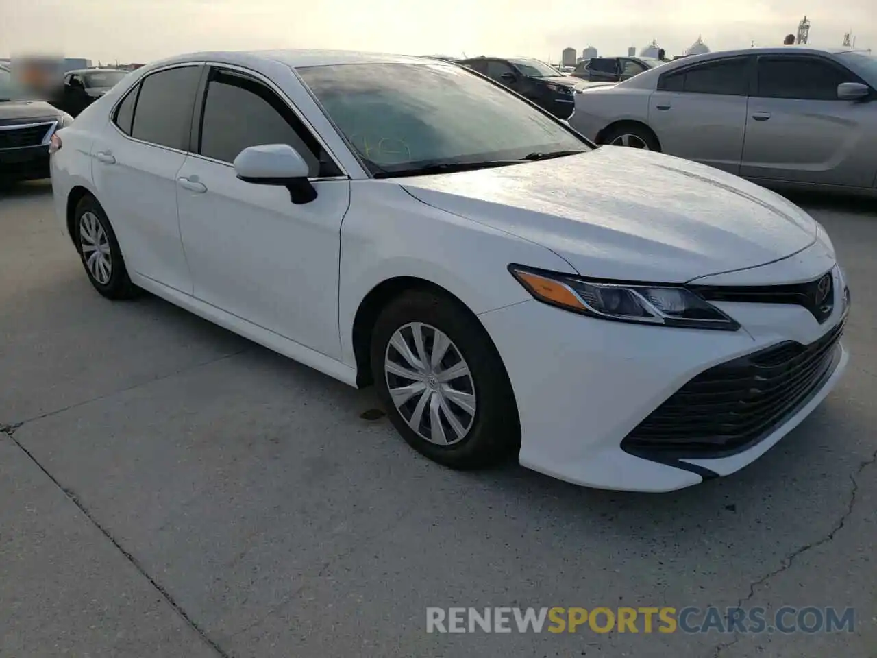 1 Photograph of a damaged car 4T1B11HK2KU824929 TOYOTA CAMRY 2019