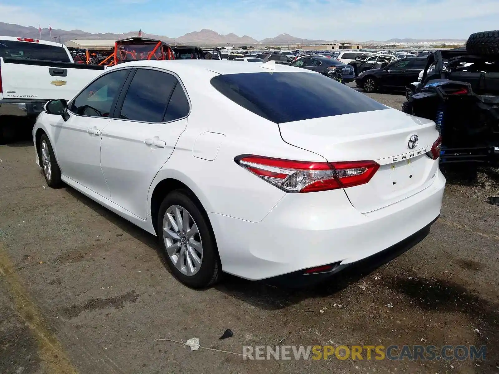 3 Photograph of a damaged car 4T1B11HK2KU825935 TOYOTA CAMRY 2019