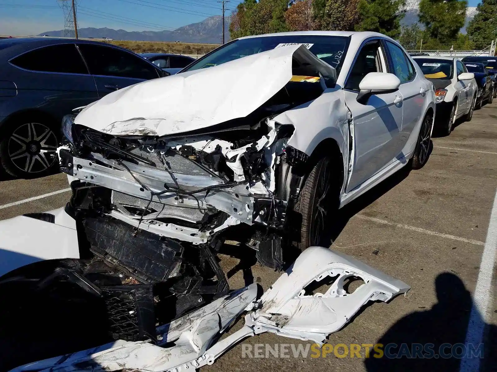 2 Photograph of a damaged car 4T1B11HK2KU827412 TOYOTA CAMRY 2019