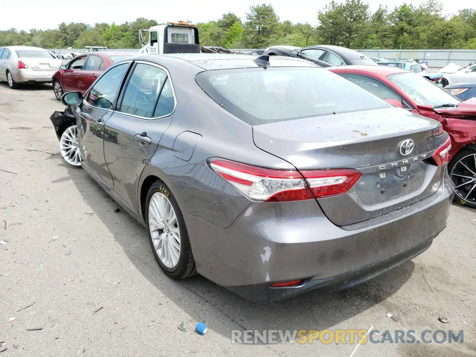 3 Photograph of a damaged car 4T1B11HK2KU828804 TOYOTA CAMRY 2019