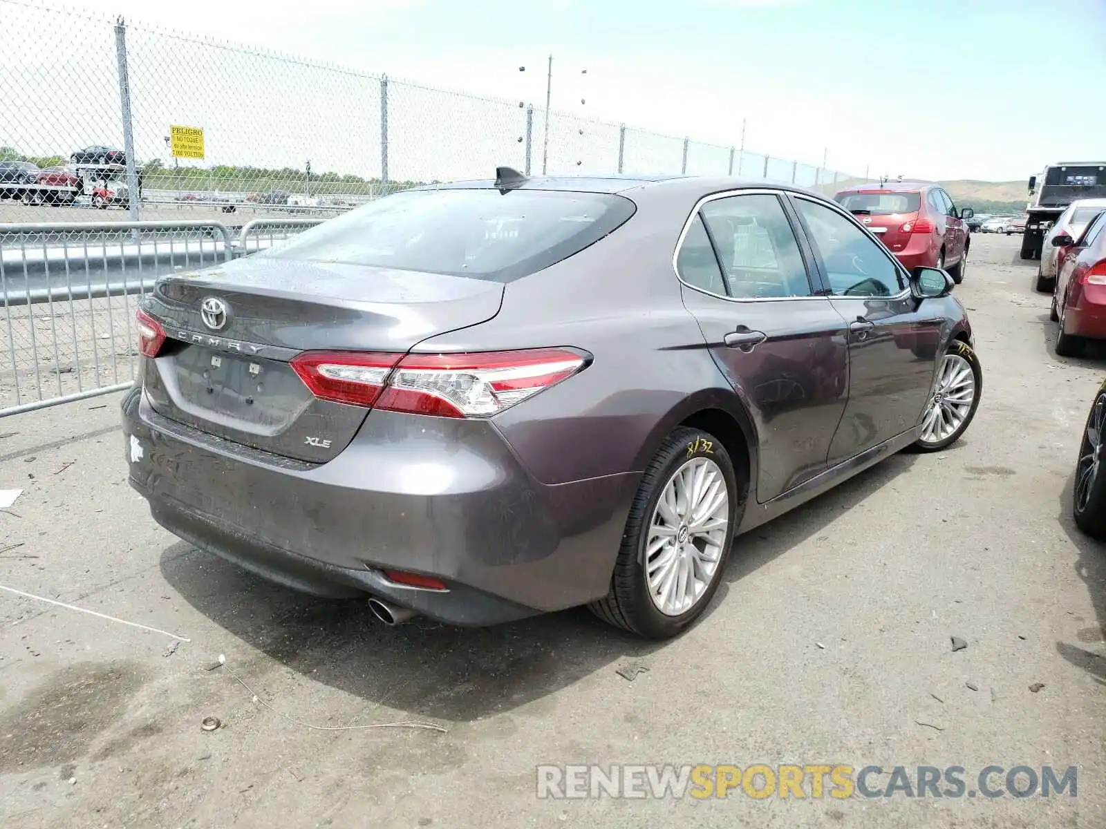 4 Photograph of a damaged car 4T1B11HK2KU828804 TOYOTA CAMRY 2019