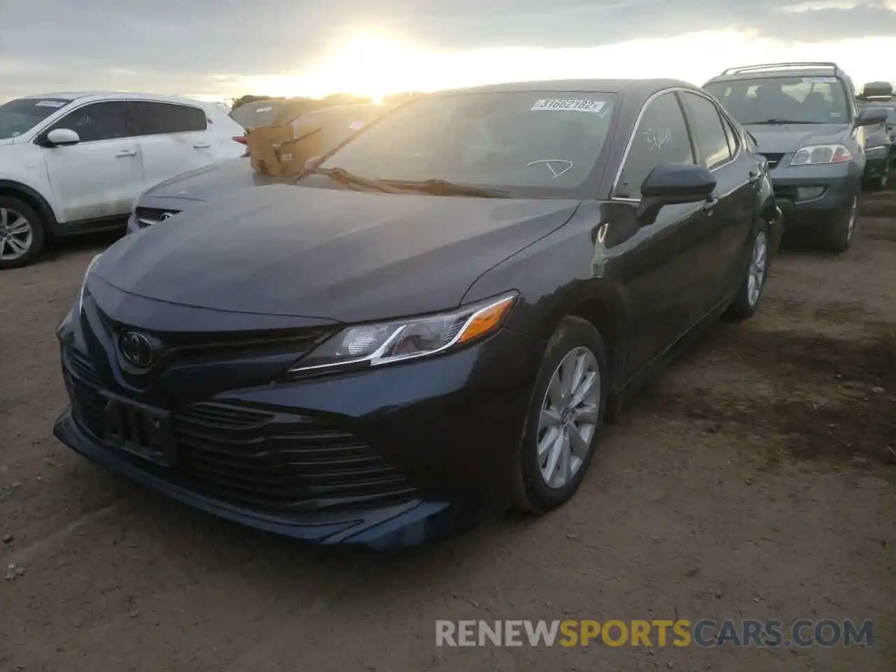 2 Photograph of a damaged car 4T1B11HK2KU846574 TOYOTA CAMRY 2019