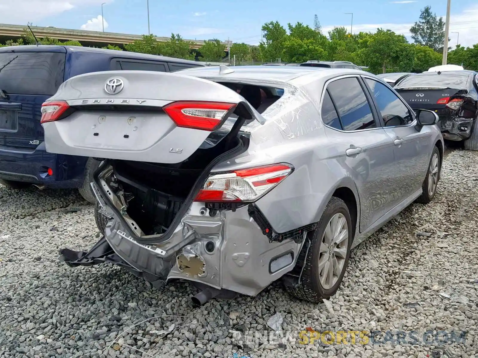 4 Photograph of a damaged car 4T1B11HK3KU169406 TOYOTA CAMRY 2019