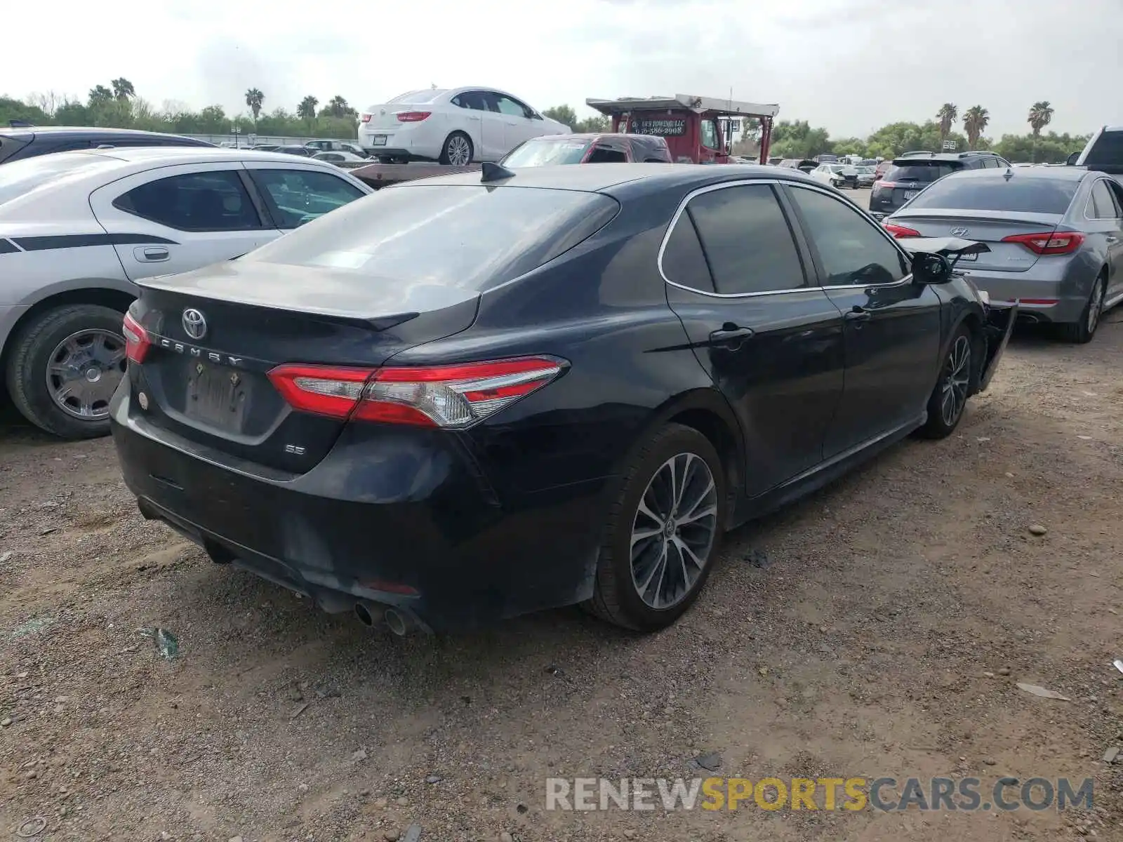 4 Photograph of a damaged car 4T1B11HK3KU170488 TOYOTA CAMRY 2019