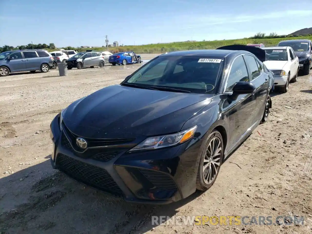 2 Photograph of a damaged car 4T1B11HK3KU170944 TOYOTA CAMRY 2019