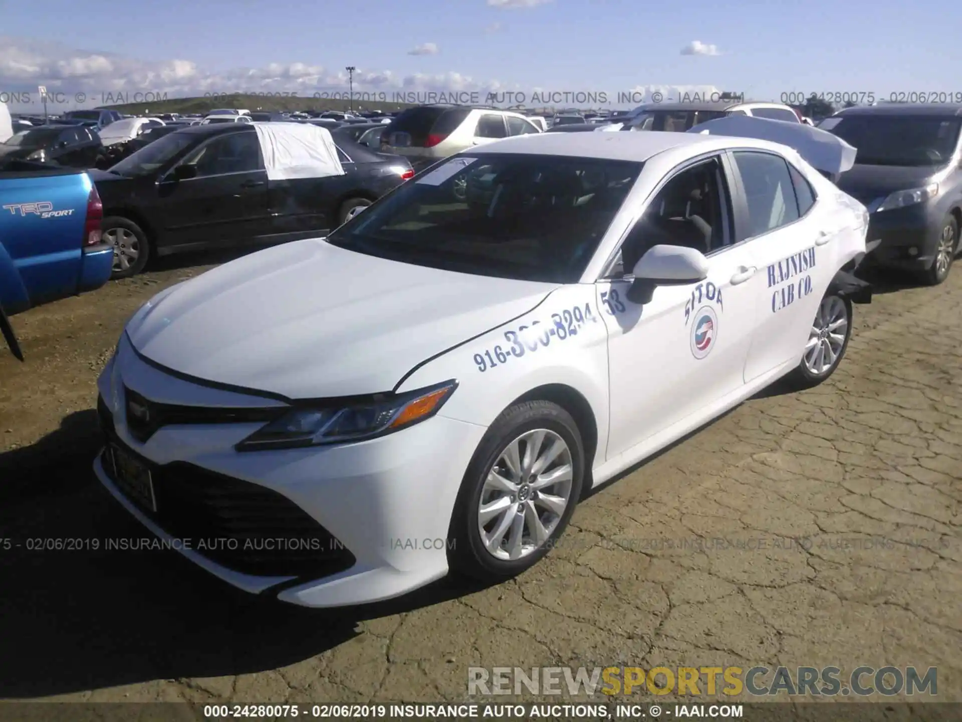 2 Photograph of a damaged car 4T1B11HK3KU171463 TOYOTA CAMRY 2019