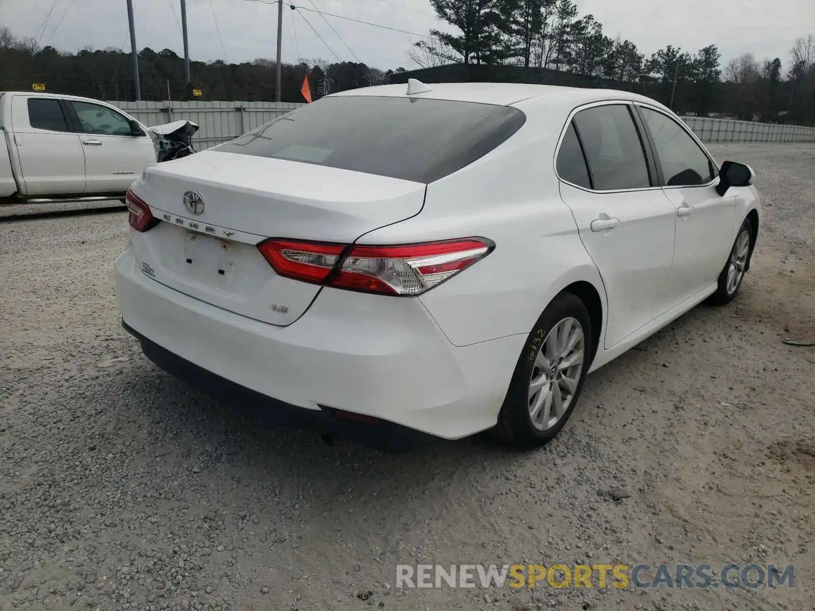 4 Photograph of a damaged car 4T1B11HK3KU173083 TOYOTA CAMRY 2019