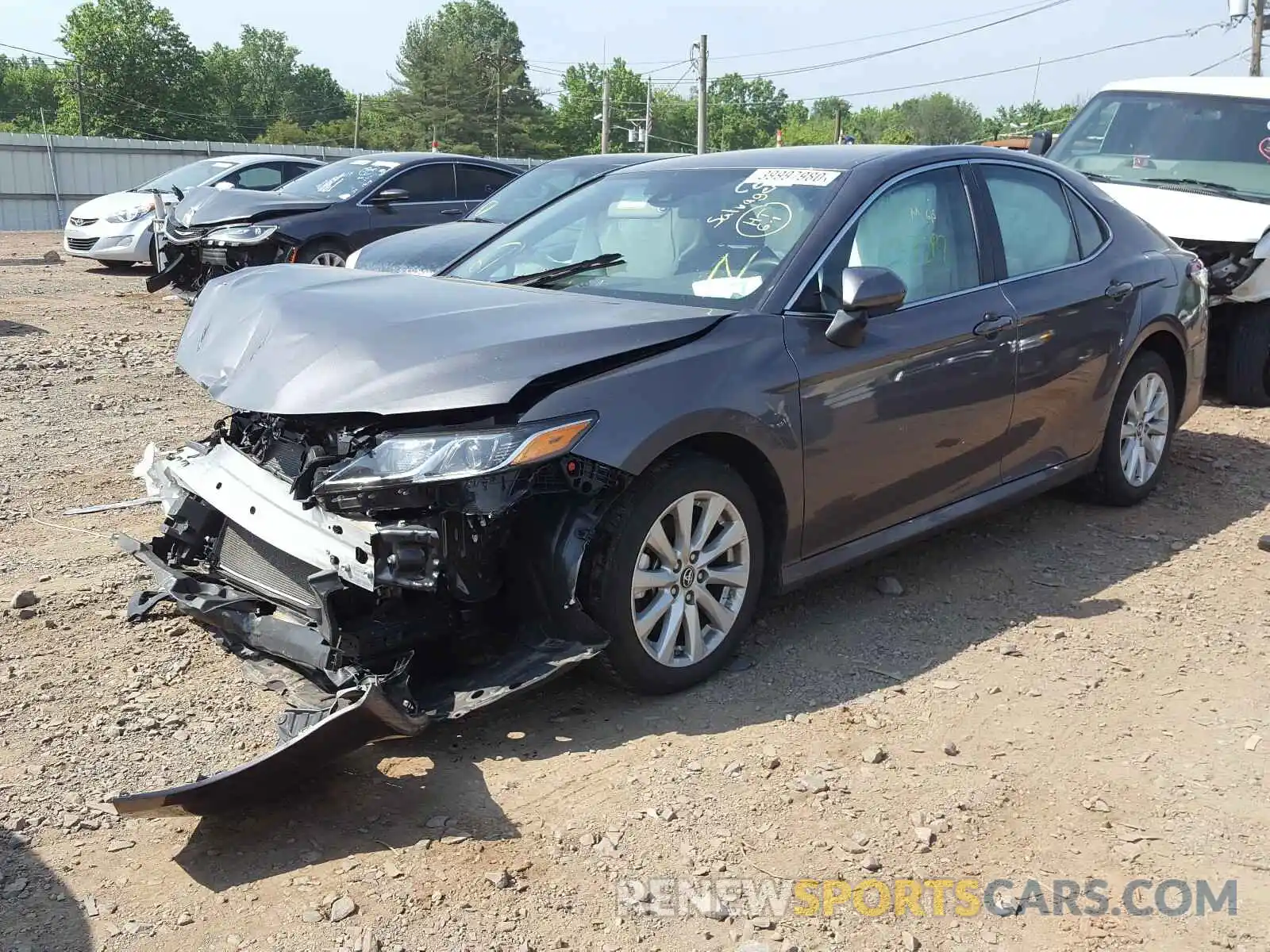 2 Photograph of a damaged car 4T1B11HK3KU193169 TOYOTA CAMRY 2019