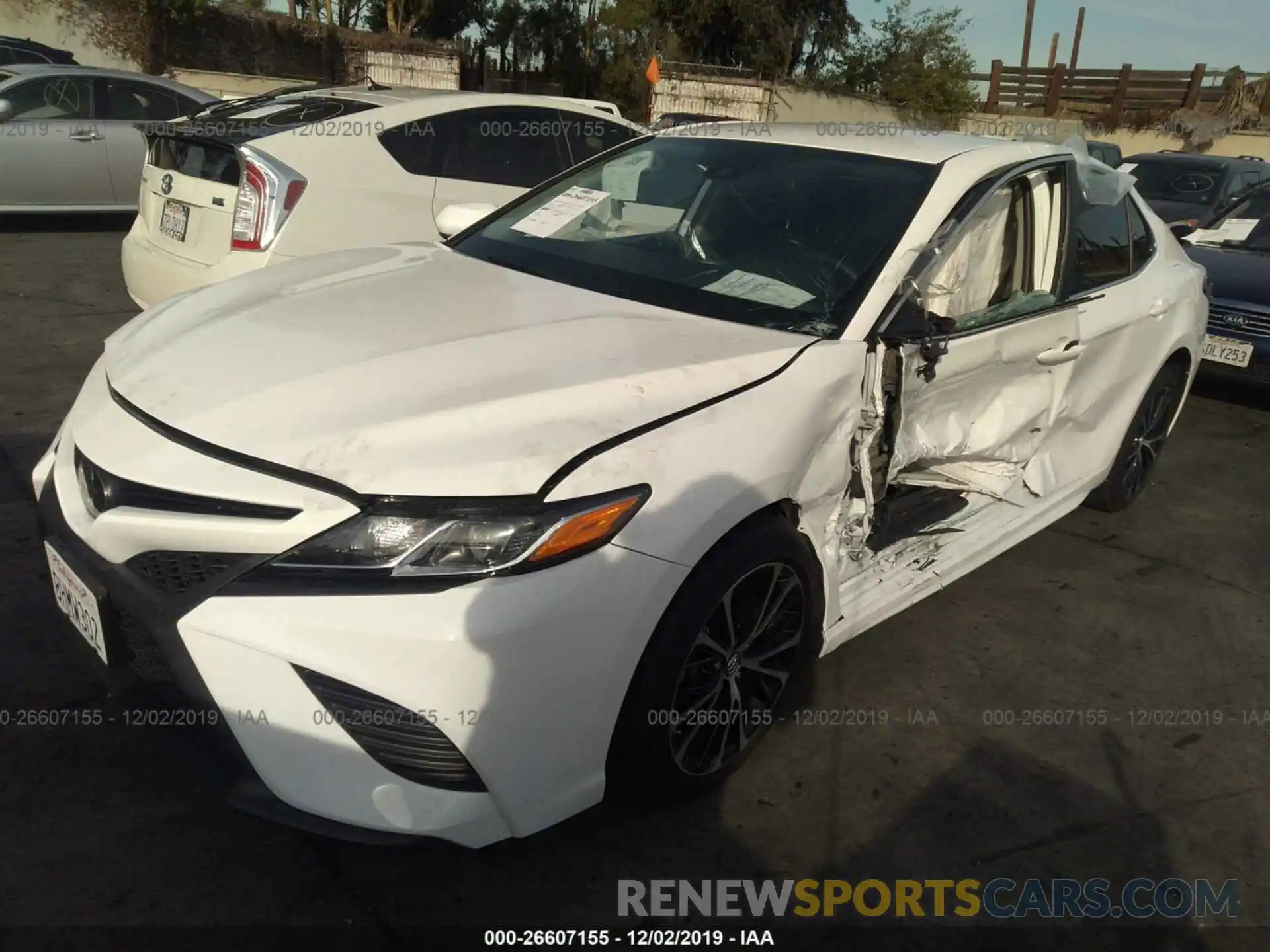 2 Photograph of a damaged car 4T1B11HK3KU193298 TOYOTA CAMRY 2019