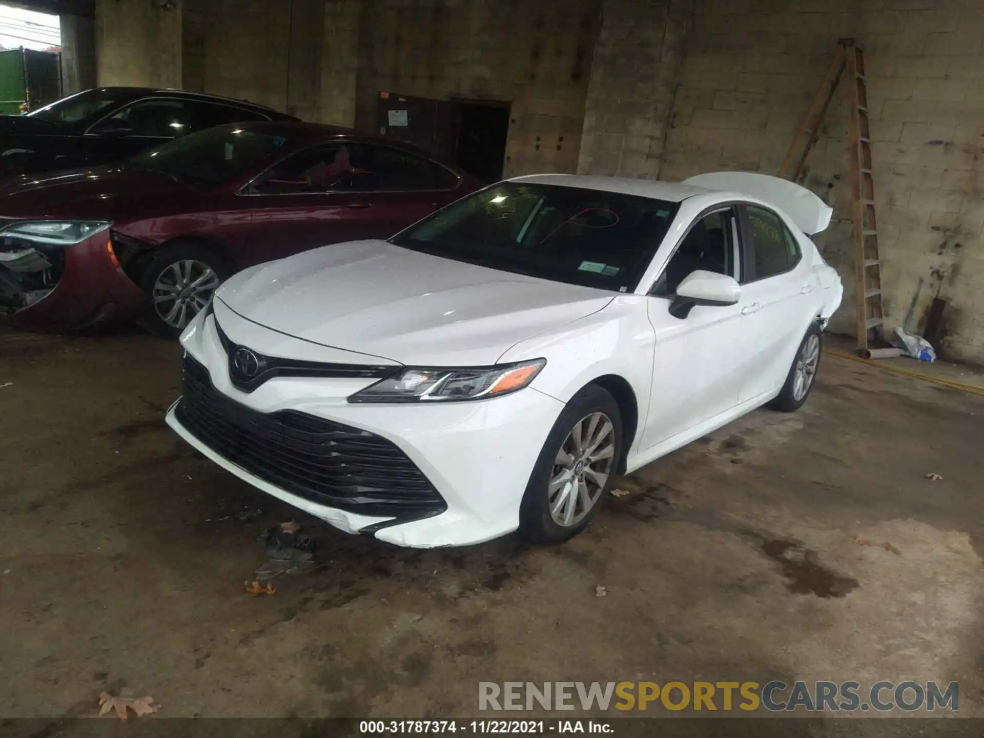 2 Photograph of a damaged car 4T1B11HK3KU196363 TOYOTA CAMRY 2019