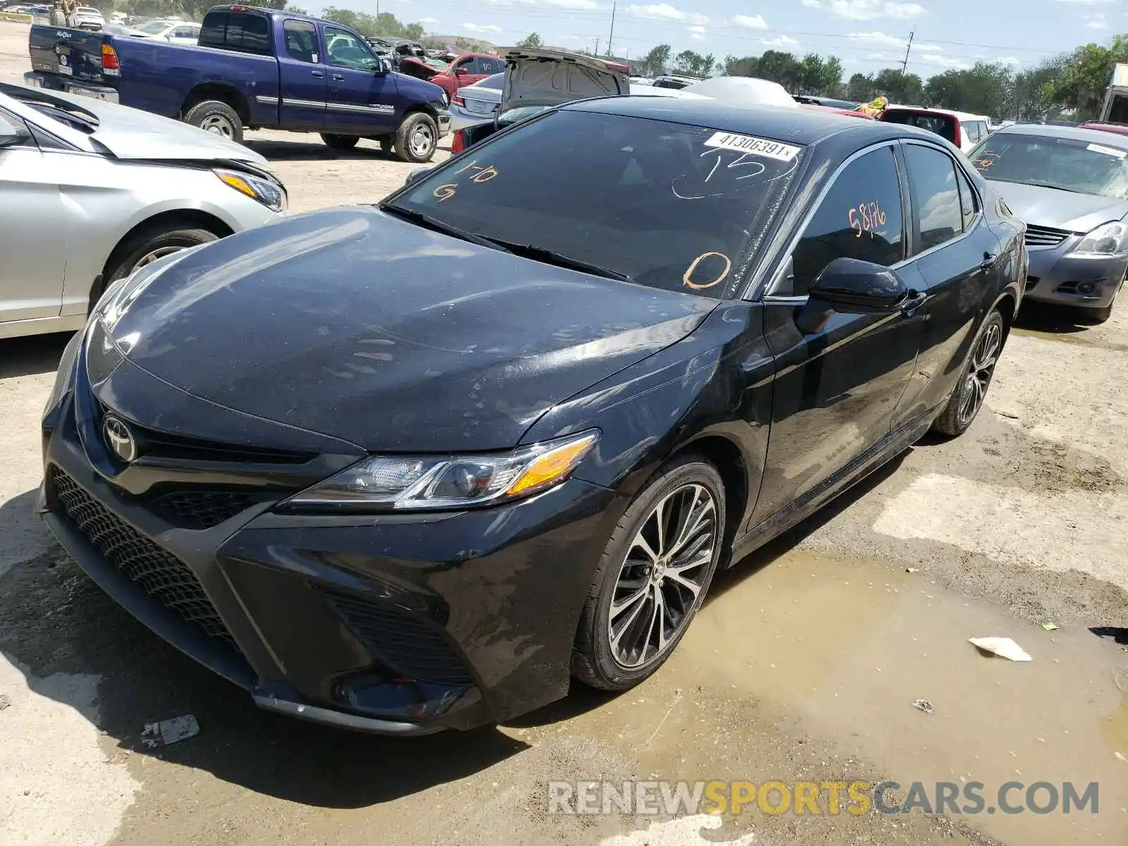 2 Photograph of a damaged car 4T1B11HK3KU202369 TOYOTA CAMRY 2019