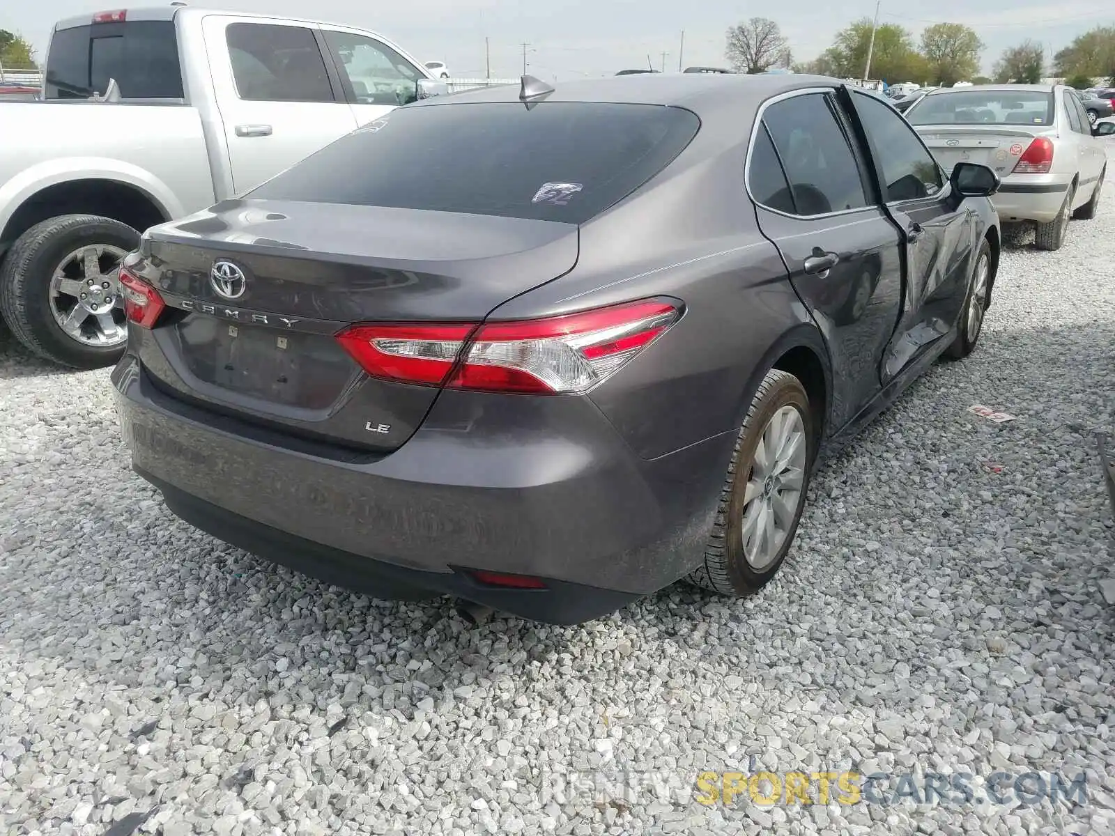 4 Photograph of a damaged car 4T1B11HK3KU207717 TOYOTA CAMRY 2019