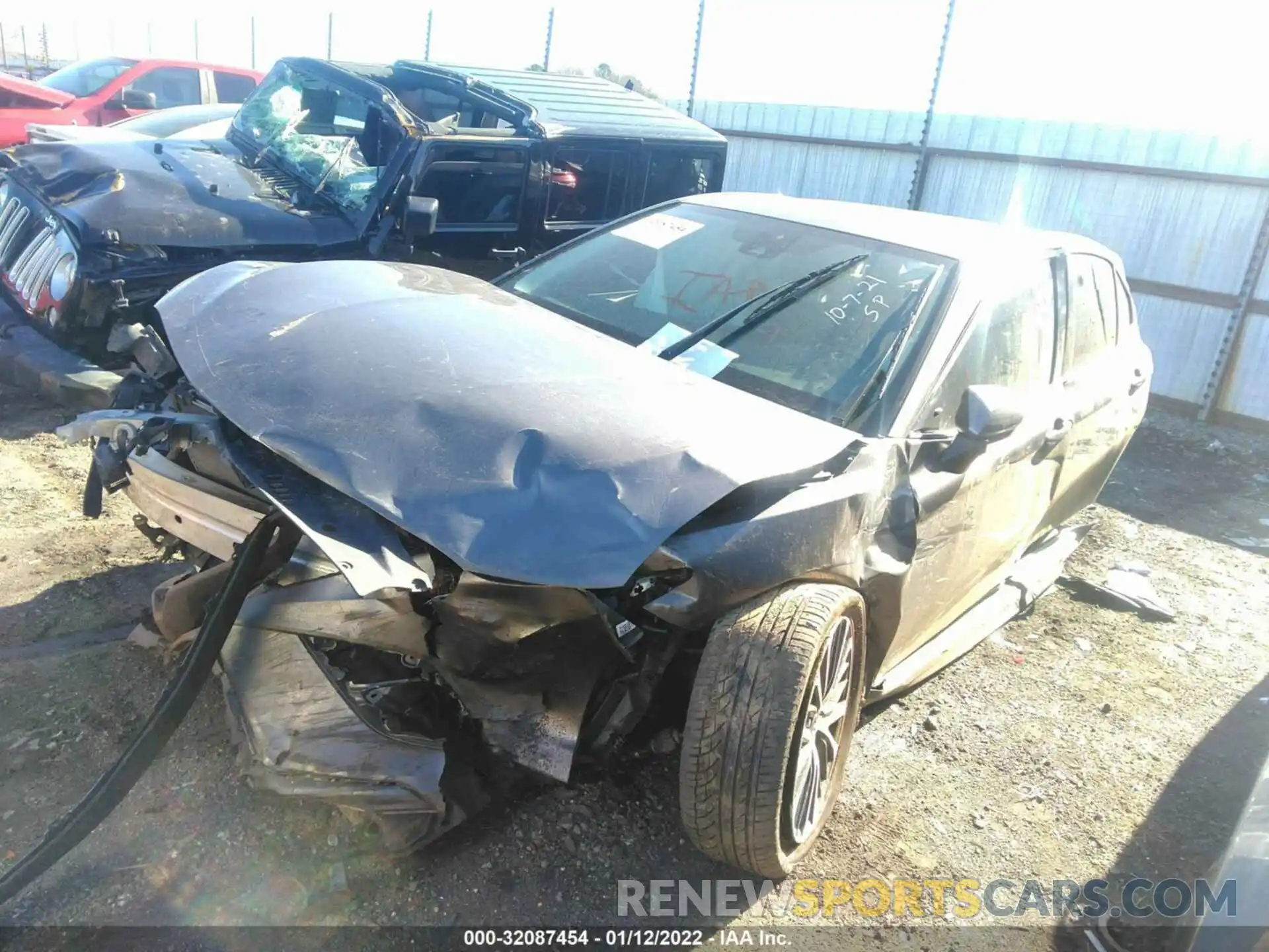 2 Photograph of a damaged car 4T1B11HK3KU209063 TOYOTA CAMRY 2019