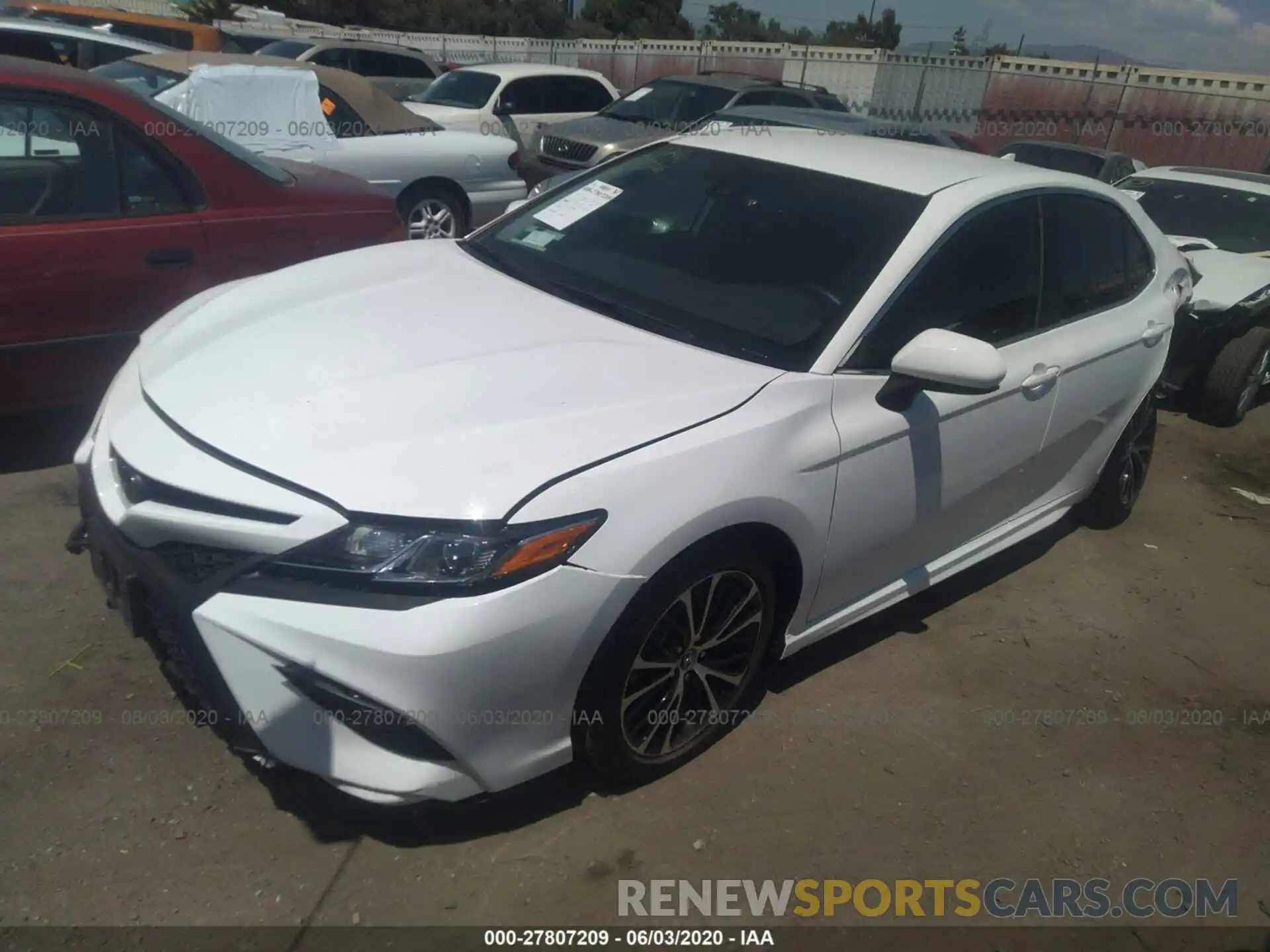 2 Photograph of a damaged car 4T1B11HK3KU210889 TOYOTA CAMRY 2019