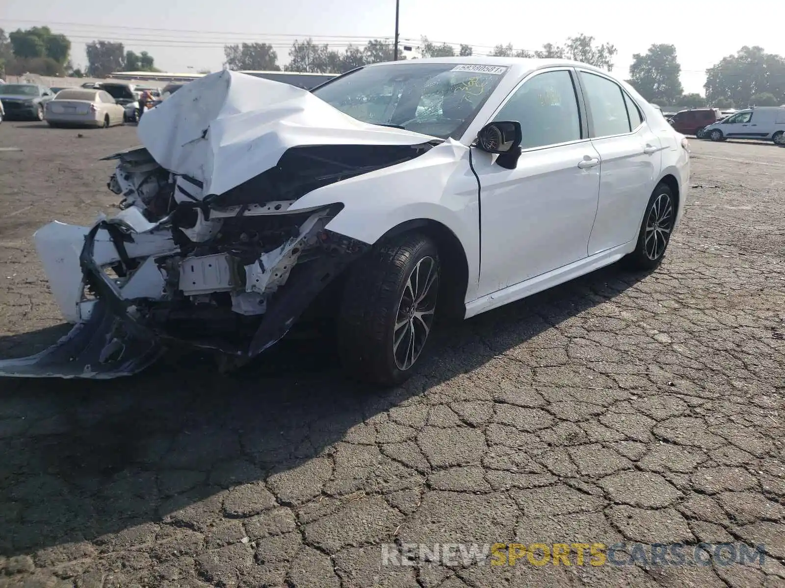 2 Photograph of a damaged car 4T1B11HK3KU211590 TOYOTA CAMRY 2019