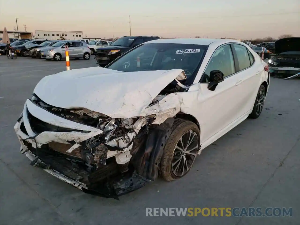 2 Photograph of a damaged car 4T1B11HK3KU211640 TOYOTA CAMRY 2019