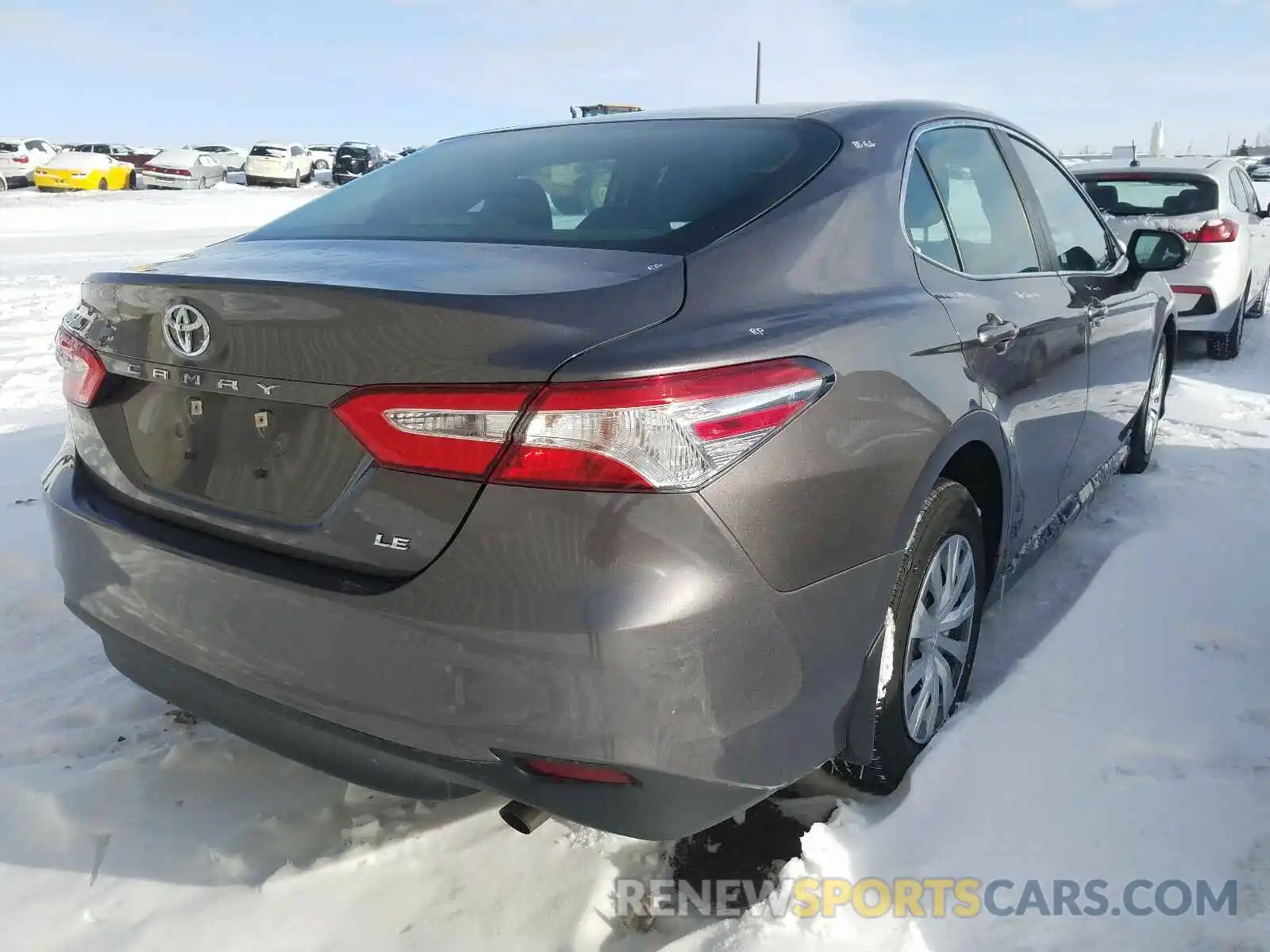 4 Photograph of a damaged car 4T1B11HK3KU212562 TOYOTA CAMRY 2019