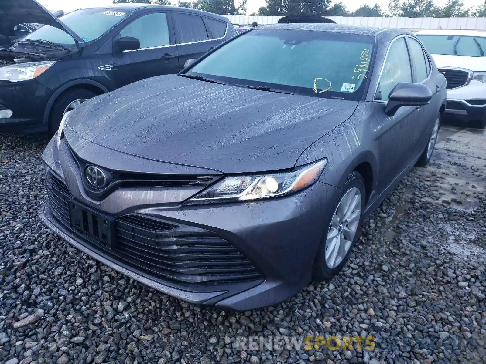 2 Photograph of a damaged car 4T1B11HK3KU213131 TOYOTA CAMRY 2019