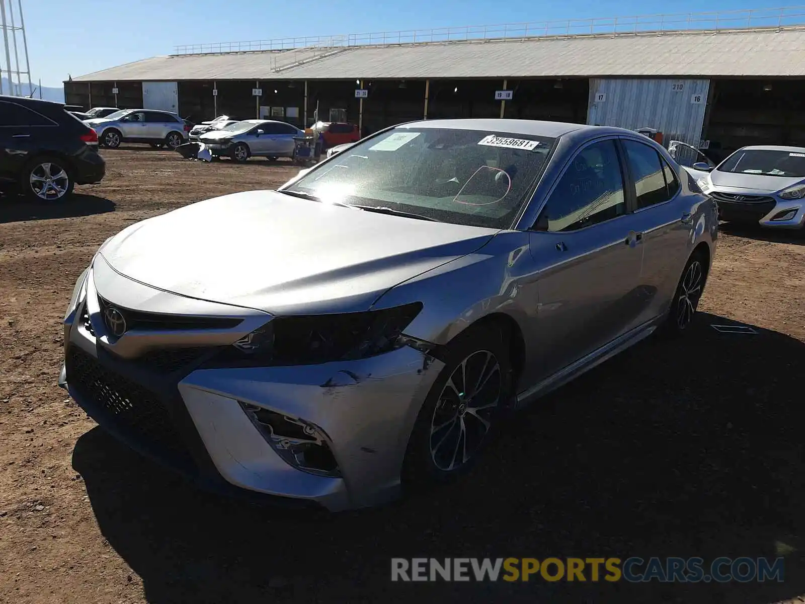 2 Photograph of a damaged car 4T1B11HK3KU213243 TOYOTA CAMRY 2019