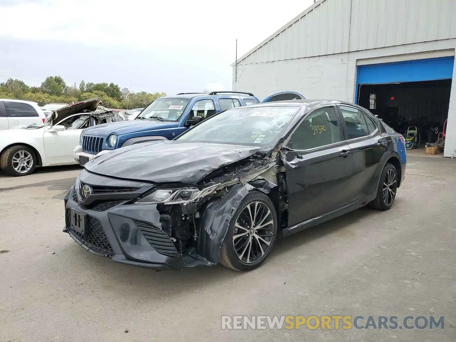 2 Photograph of a damaged car 4T1B11HK3KU214991 TOYOTA CAMRY 2019