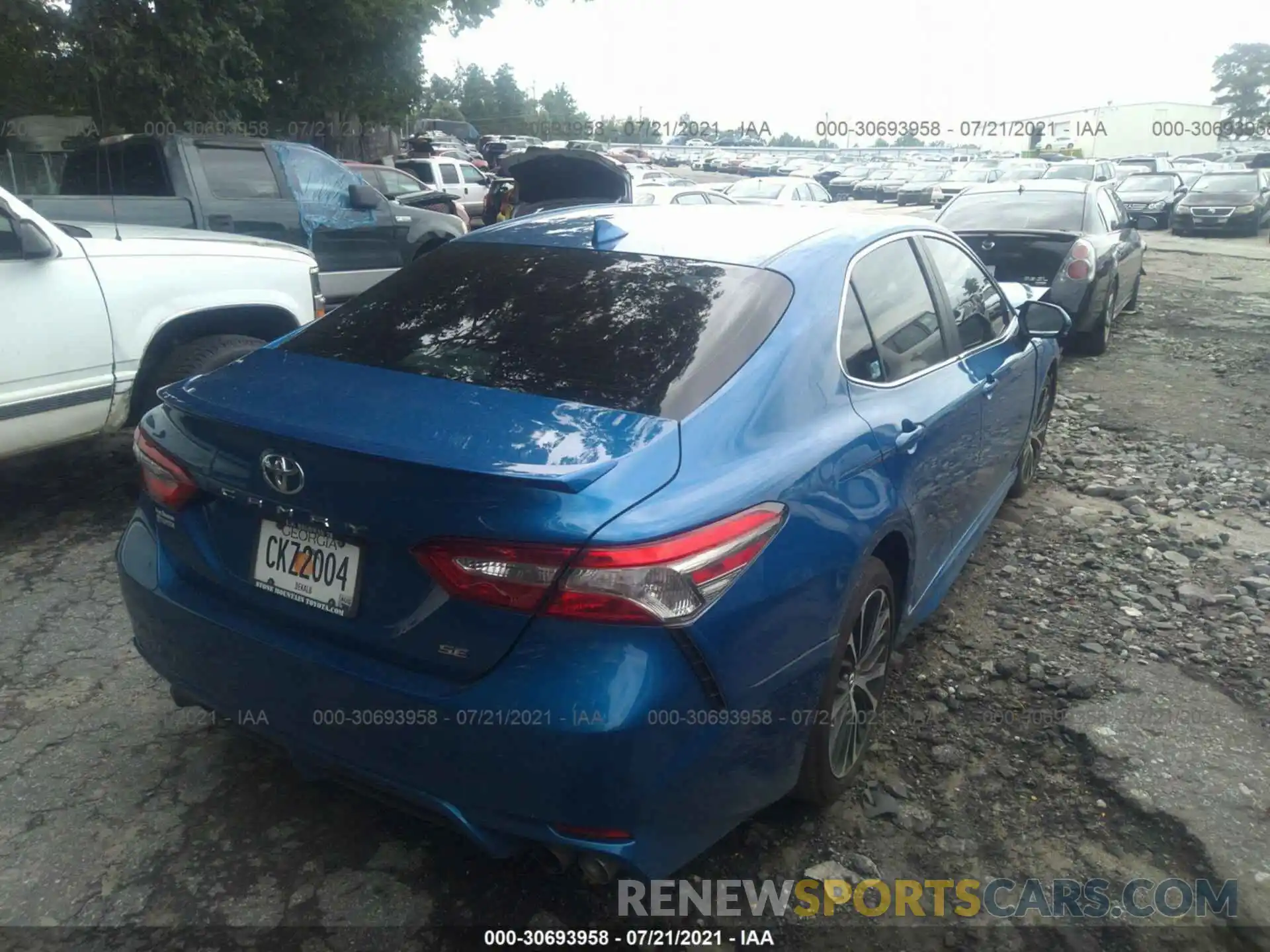 4 Photograph of a damaged car 4T1B11HK3KU216496 TOYOTA CAMRY 2019