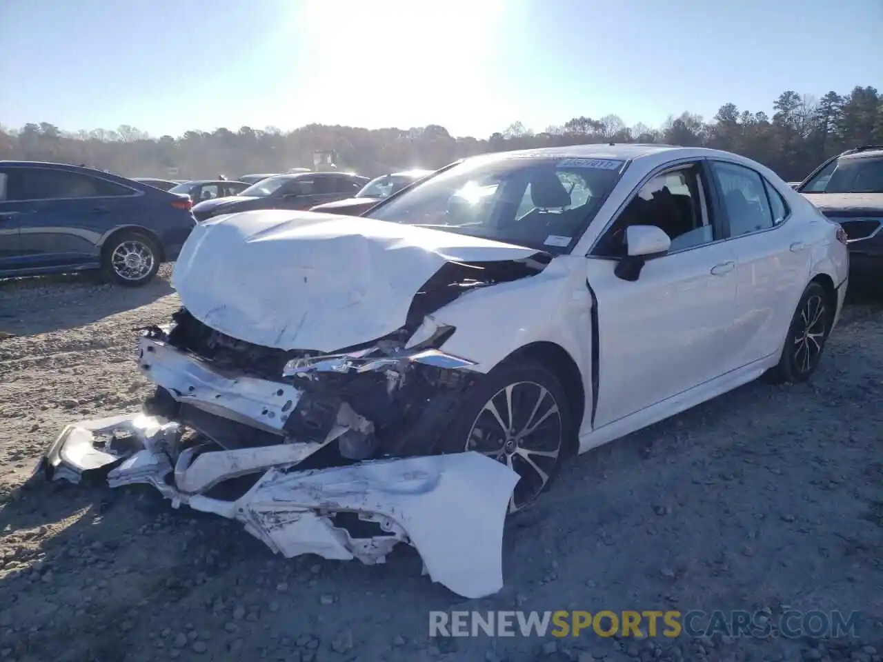 2 Photograph of a damaged car 4T1B11HK3KU217390 TOYOTA CAMRY 2019