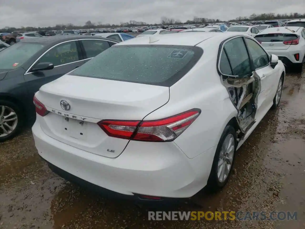 4 Photograph of a damaged car 4T1B11HK3KU217986 TOYOTA CAMRY 2019