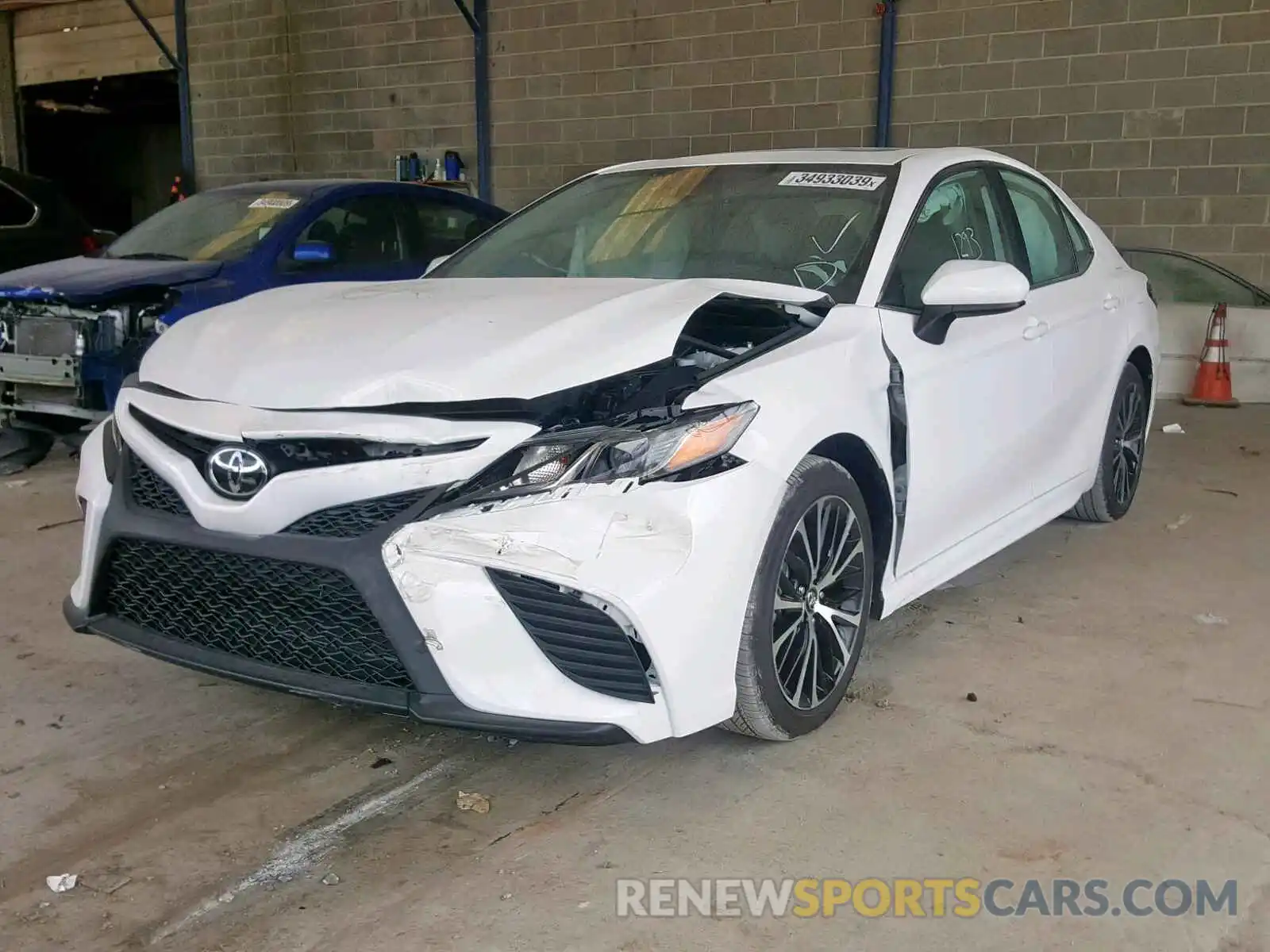 2 Photograph of a damaged car 4T1B11HK3KU218801 TOYOTA CAMRY 2019