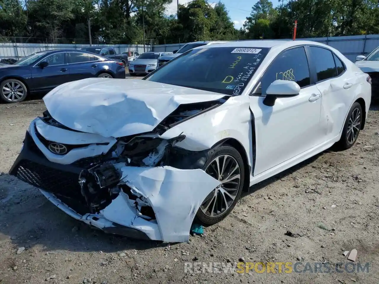 2 Photograph of a damaged car 4T1B11HK3KU219169 TOYOTA CAMRY 2019