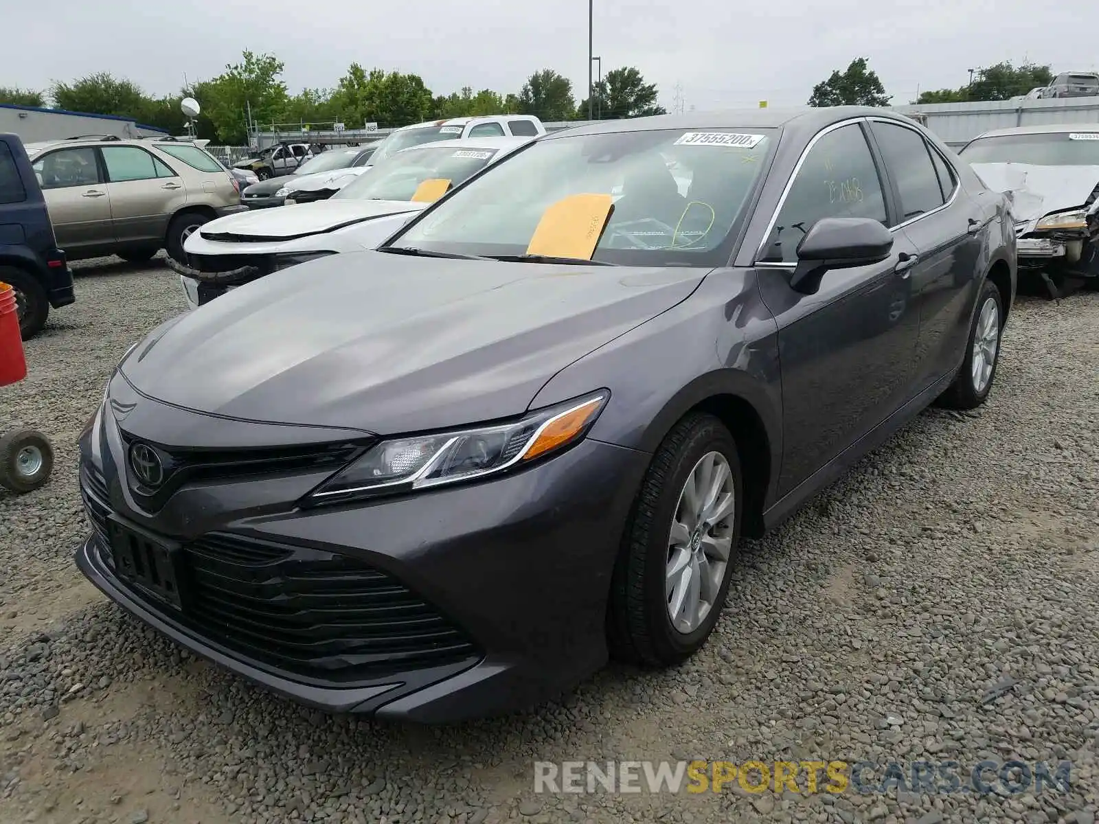 2 Photograph of a damaged car 4T1B11HK3KU220886 TOYOTA CAMRY 2019