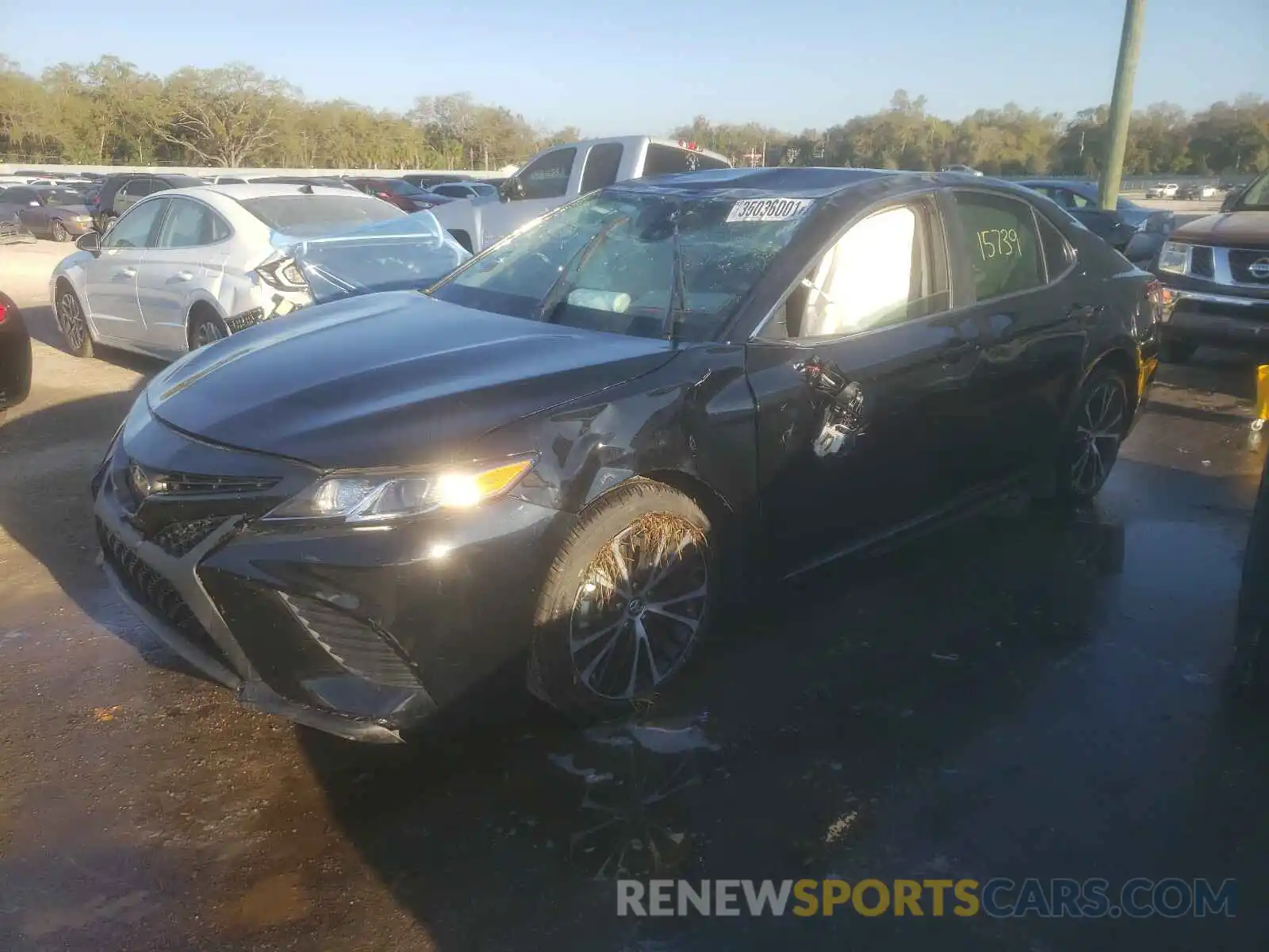 2 Photograph of a damaged car 4T1B11HK3KU225389 TOYOTA CAMRY 2019