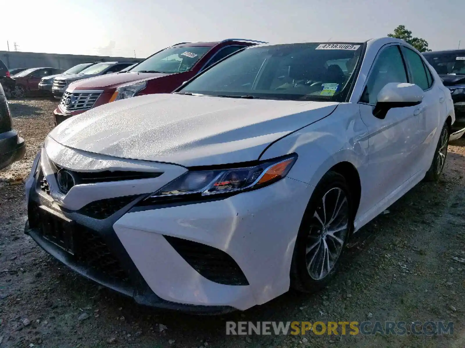 2 Photograph of a damaged car 4T1B11HK3KU225571 TOYOTA CAMRY 2019