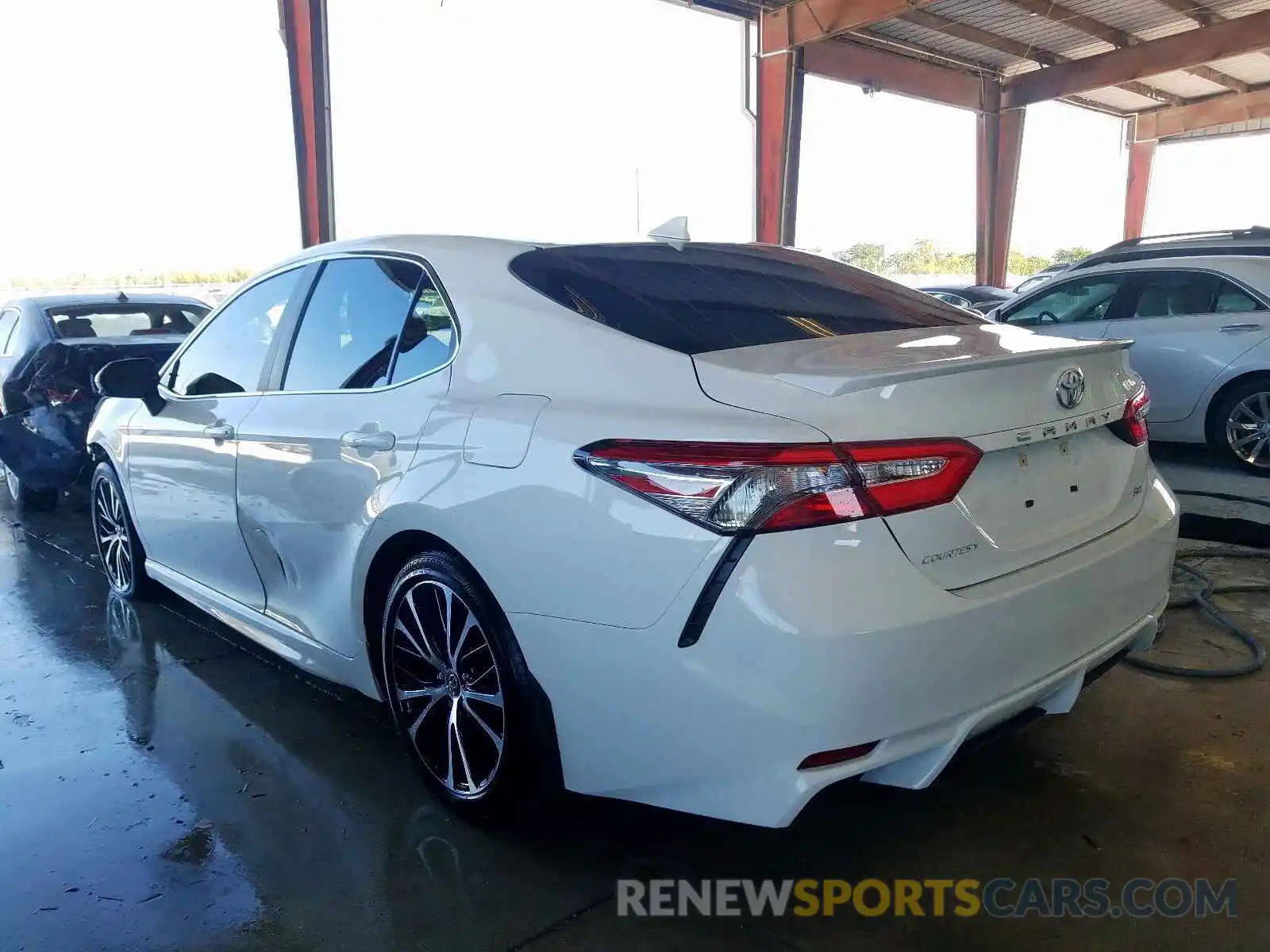 3 Photograph of a damaged car 4T1B11HK3KU231306 TOYOTA CAMRY 2019