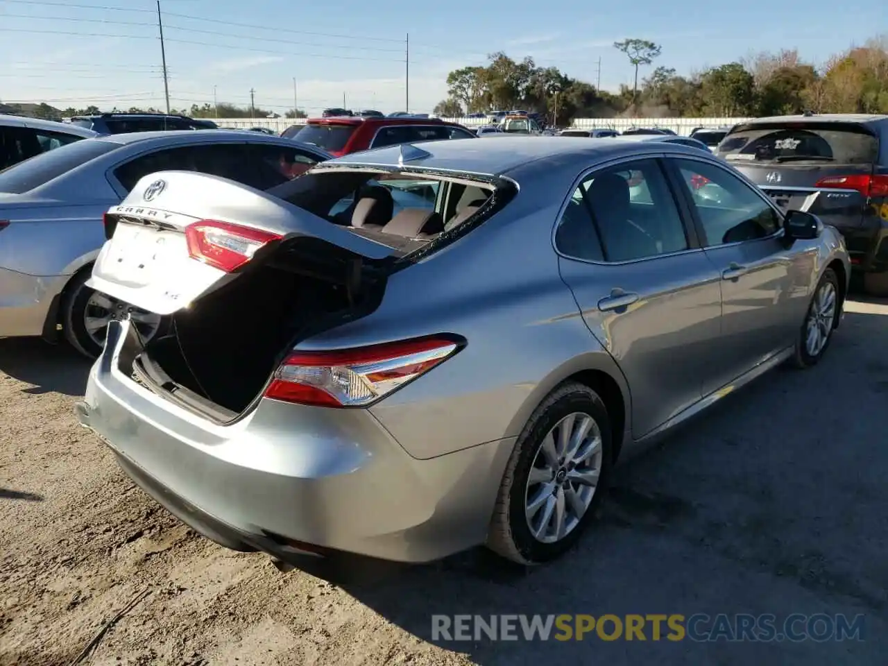 4 Photograph of a damaged car 4T1B11HK3KU231483 TOYOTA CAMRY 2019