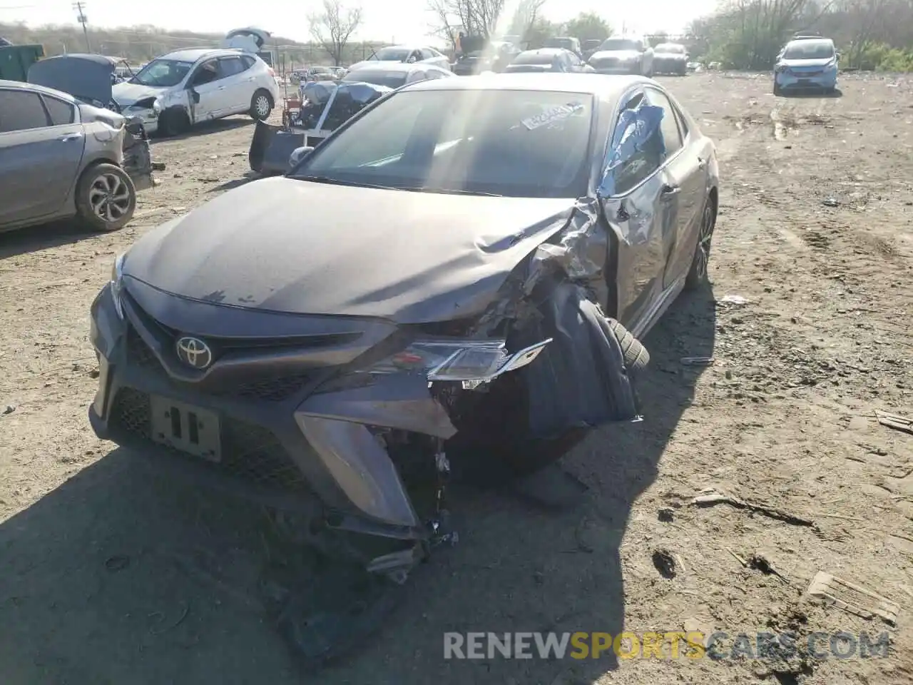 2 Photograph of a damaged car 4T1B11HK3KU233024 TOYOTA CAMRY 2019