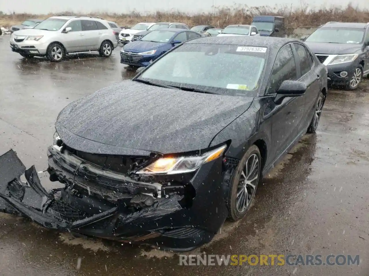 2 Photograph of a damaged car 4T1B11HK3KU234027 TOYOTA CAMRY 2019