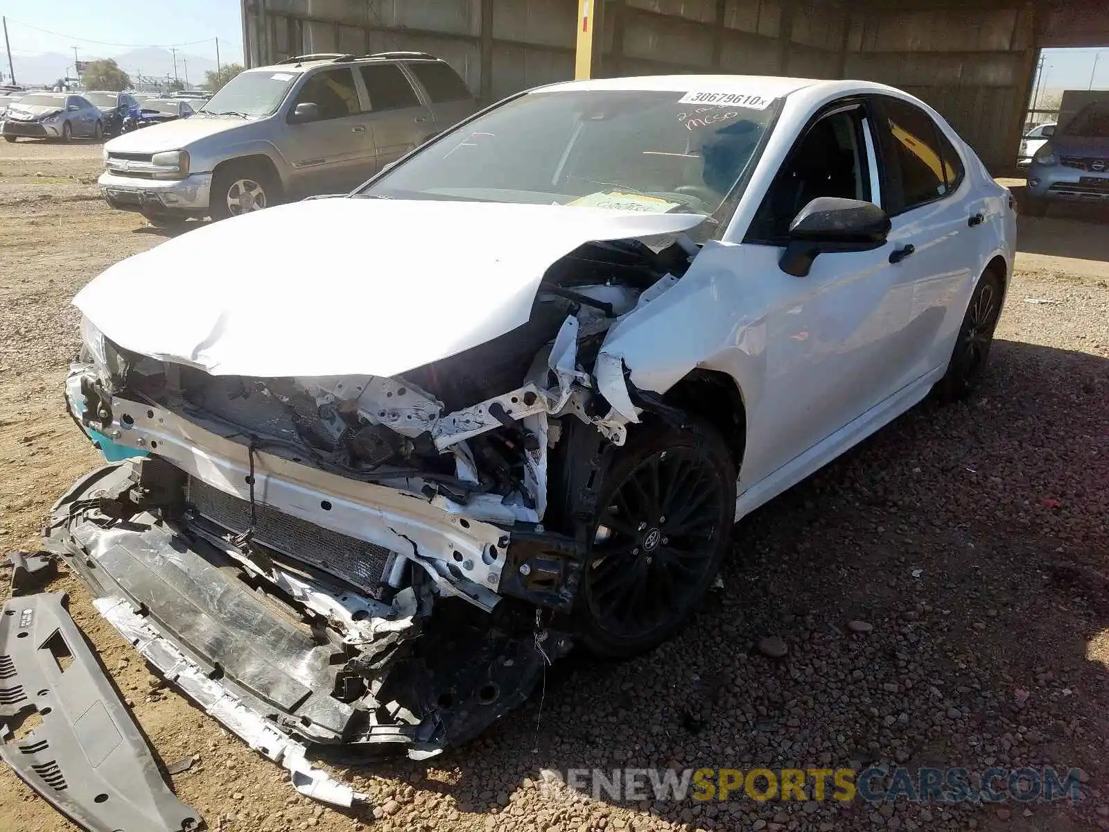 2 Photograph of a damaged car 4T1B11HK3KU235694 TOYOTA CAMRY 2019