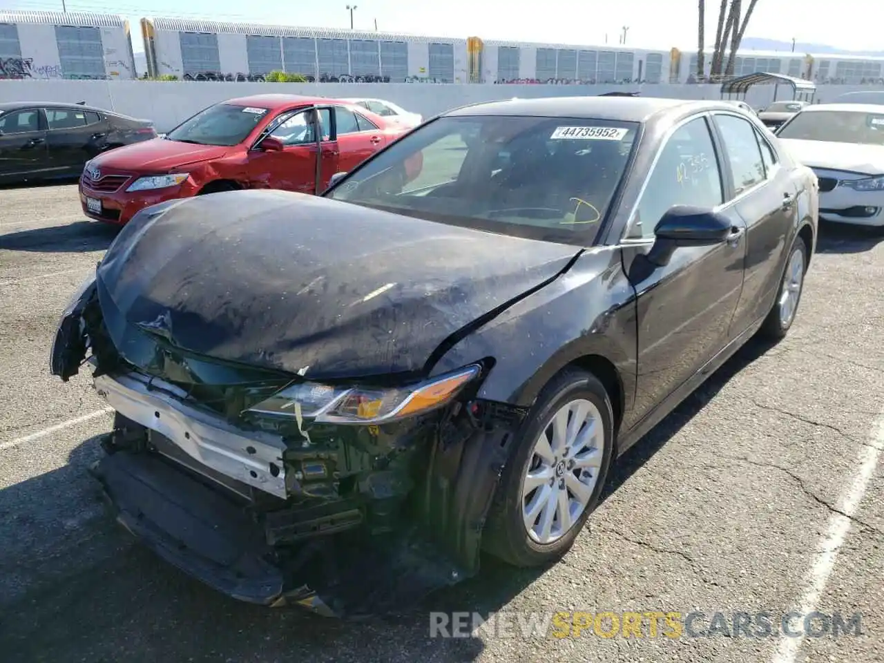 2 Photograph of a damaged car 4T1B11HK3KU236666 TOYOTA CAMRY 2019