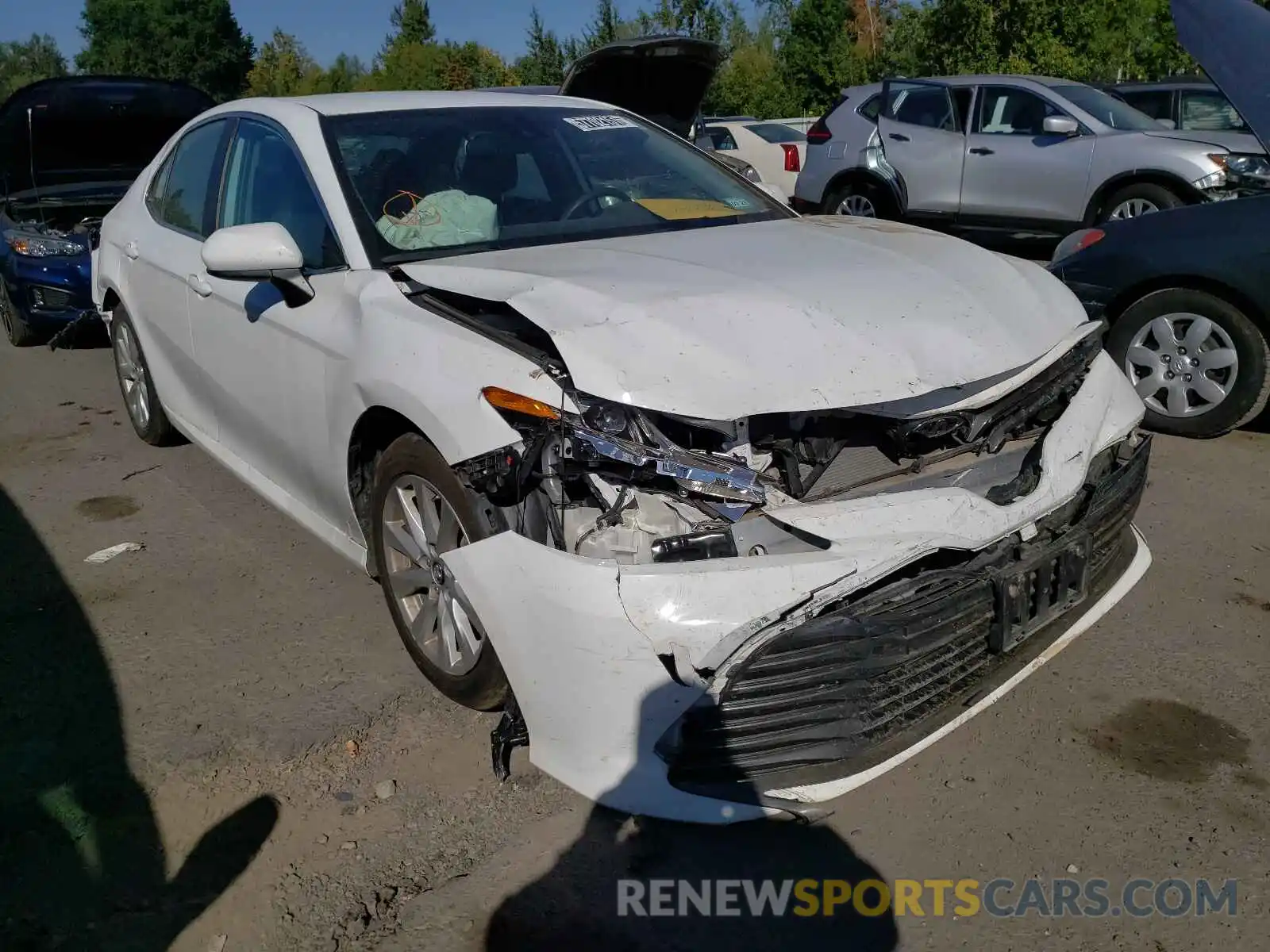 1 Photograph of a damaged car 4T1B11HK3KU239308 TOYOTA CAMRY 2019