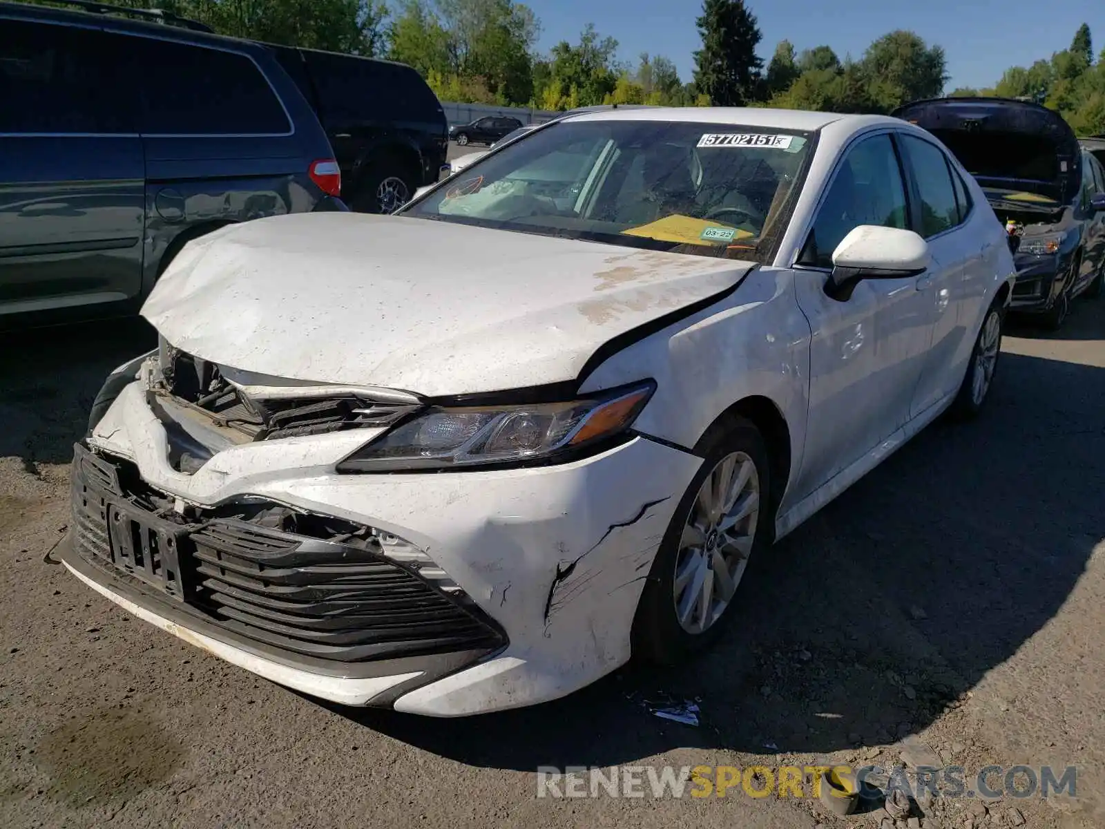 2 Photograph of a damaged car 4T1B11HK3KU239308 TOYOTA CAMRY 2019